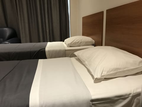 Twin Room | Premium bedding, desk, soundproofing, rollaway beds