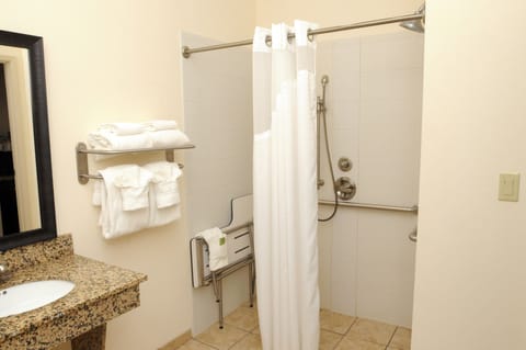 Room, 1 King Bed, Accessible (Comms Accessible. Roll-In Shower) | Bathroom | Hair dryer, towels