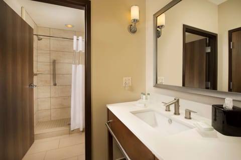 Suite, 1 King Bed, Accessible (Mobility & Hearing, Roll-in Shower) | Bathroom | Combined shower/tub, designer toiletries, hair dryer, towels