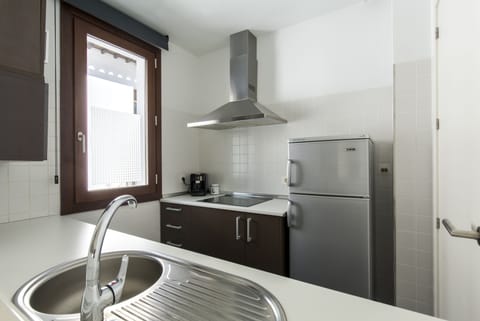 Apartment, 2 Bedrooms | Private kitchen | Full-size fridge, microwave, stovetop, coffee/tea maker