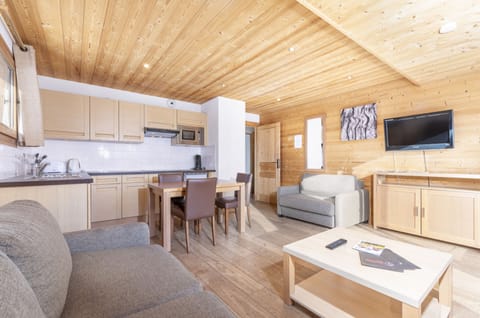 32-inch flat-screen TV with satellite channels, TV