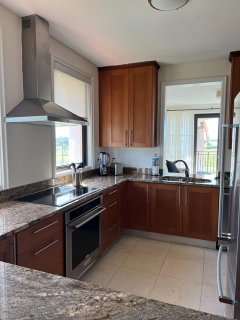 Superior Villa, 3 Bedrooms, Partial Ocean View | Private kitchen | Fridge, microwave, oven, stovetop