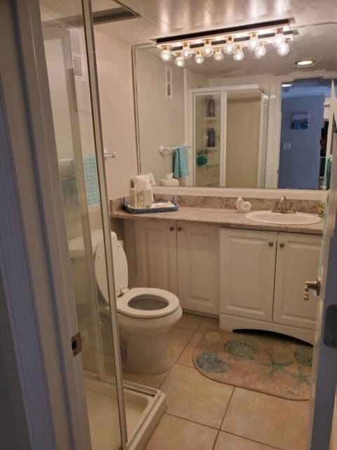 Condo, Multiple Beds, Kitchen, Beach View | Bathroom | Designer toiletries