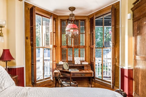 Bordello Room | Premium bedding, pillowtop beds, individually decorated