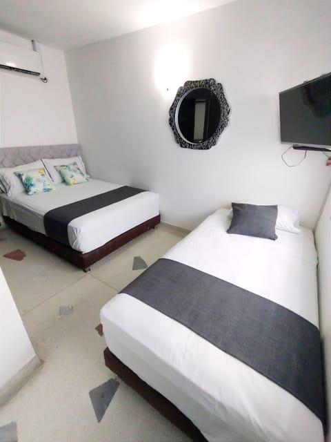 Standard Triple Room | Desk, laptop workspace, soundproofing, free WiFi