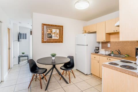 Deluxe Suite, 2 Bedrooms | Private kitchen | Fridge, oven, stovetop, coffee/tea maker