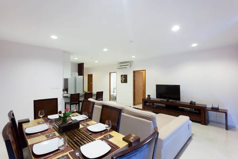 Deluxe Apartment, 3 Bedrooms | Living area | LCD TV