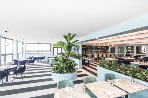 Breakfast, lunch, dinner served; French cuisine, beach views 