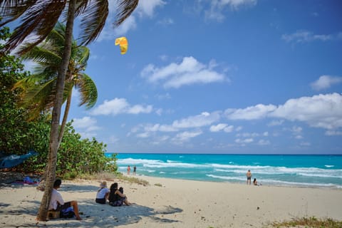 Beach nearby, white sand, 3 beach bars