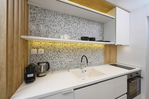 Superior Suite | Private kitchen | Full-size fridge, oven, stovetop, espresso maker