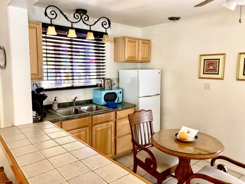 Studio, 1 King Bed, Fireplace | Private kitchen | Fridge, microwave, coffee/tea maker, toaster