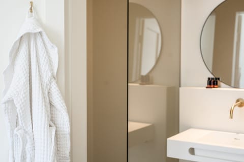 Luxury Double Room | Bathroom | Hair dryer, bathrobes, towels, soap