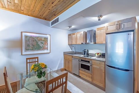 Deluxe Suite, 1 Bedroom | Private kitchen | Fridge, microwave, oven, stovetop