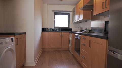 Apartment | Private kitchen | Microwave, electric kettle, toaster, cookware/dishes/utensils