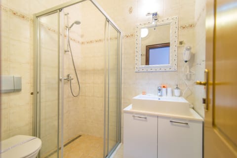 Standard Double or Twin Room | Bathroom | Hair dryer, slippers, towels, soap