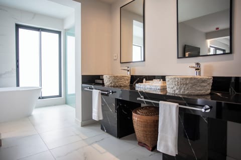 Junior Suite with bathtub | Bathroom | Designer toiletries, hair dryer, bathrobes, slippers