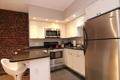 Apartment, 2 Bedrooms | Private kitchen | Mini-fridge, microwave, cookware/dishes/utensils, paper towels