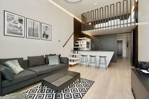 Comfort Apartment | Living area | 43-inch flat-screen TV with cable channels, TV, heated floors