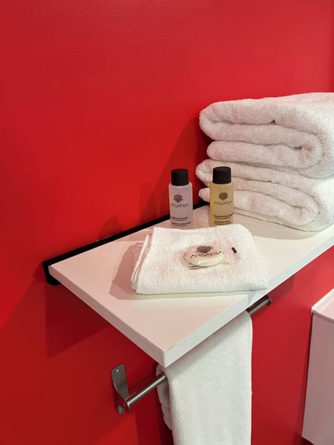 Premium bedding, memory foam beds, laptop workspace, blackout drapes