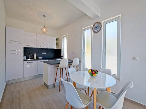 Apartment (One Bedroom Apartment with Balcony an) | Private kitchen | Fridge, dining tables