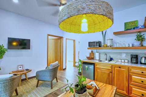 Luxury Penthouse | Private kitchen | Mini-fridge, microwave, coffee/tea maker, electric kettle