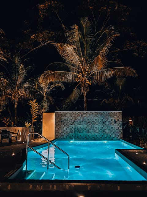 Outdoor pool, open 7:00 AM to 9:00 PM, pool umbrellas, sun loungers