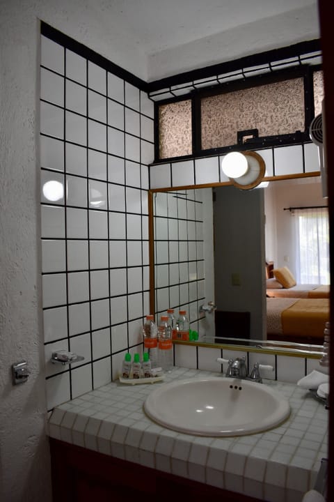 Standard Double Room, 2 Double Beds, Garden View | Bathroom sink