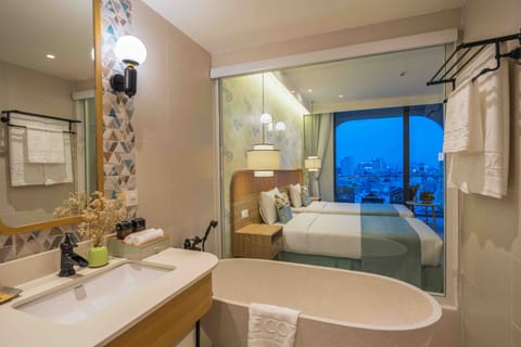 Deluxe City View Double | Bathroom | Separate tub and shower, deep soaking tub, hydromassage showerhead