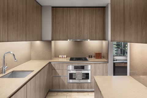 Two Bedroom Corner Residence Suite | Private kitchen | Full-size fridge, microwave, oven, stovetop