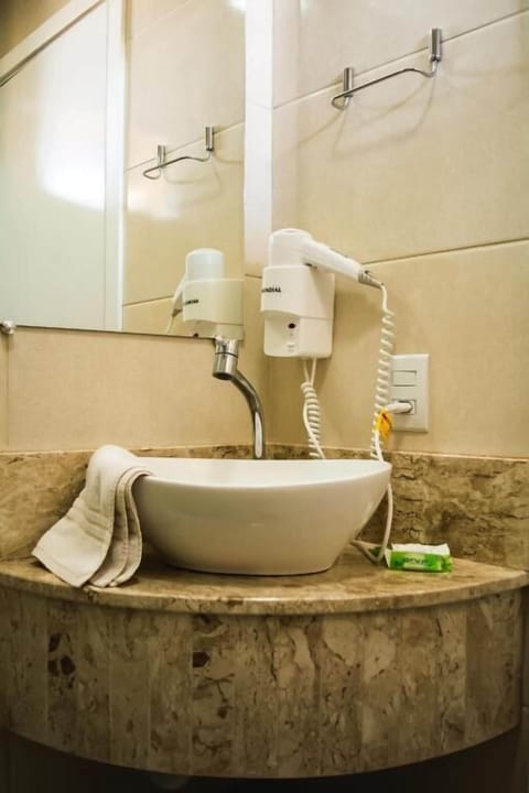 Economy Quadruple Room | Bathroom | Shower, free toiletries, hair dryer, towels