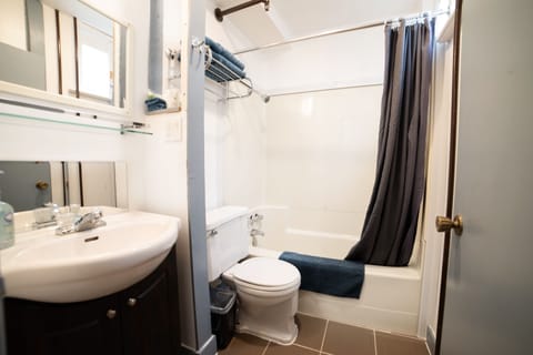 Economy Studio | Bathroom | Combined shower/tub, deep soaking tub, hair dryer, towels