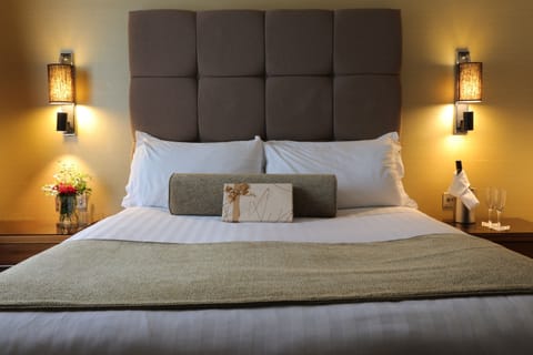 Egyptian cotton sheets, down comforters, pillowtop beds, in-room safe