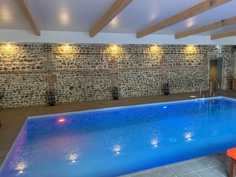 Indoor pool, open 8:00 AM to 8:00 PM, sun loungers