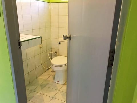 Standard Double Room (Fan) | Bathroom | Shower, free toiletries, towels