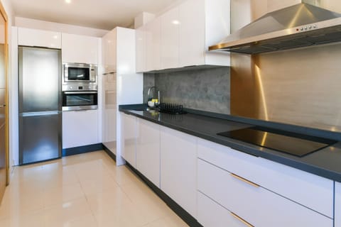 Deluxe Apartment, 2 Bedrooms, Terrace, Sea View | Private kitchen | Full-size fridge, microwave, stovetop, dishwasher