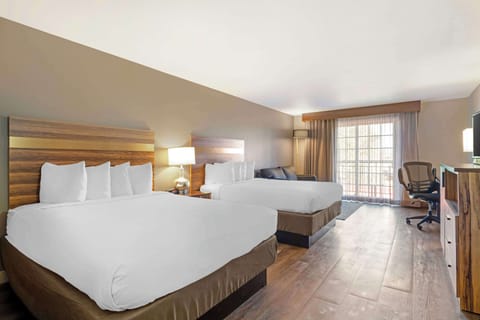 Desk, laptop workspace, iron/ironing board, free cribs/infant beds