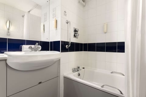 Combined shower/tub, eco-friendly toiletries, hair dryer, towels