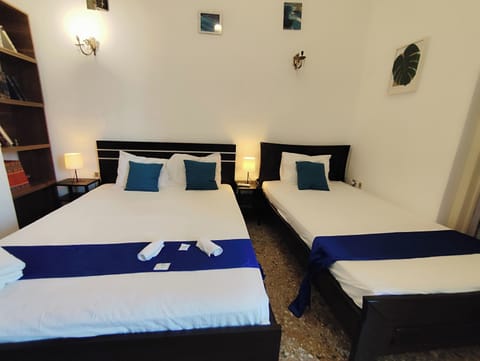 Economy Triple Room | Individually decorated, individually furnished, free WiFi, bed sheets