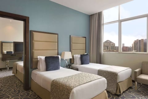 Deluxe Room, 1 Twin Bed, Partial Sea View | Premium bedding, minibar, in-room safe, desk