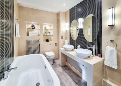 Suite, 1 Double Bed, Non Smoking | Bathroom | Combined shower/tub, designer toiletries, hair dryer, towels