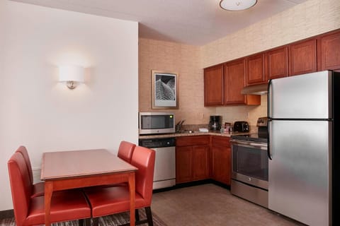 Suite, 2 Bedrooms | Private kitchen | Fridge, microwave, stovetop, dishwasher