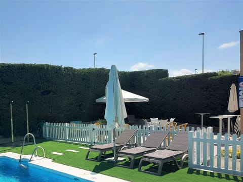 Outdoor pool, sun loungers