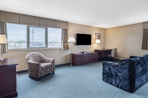 Suite, 2 Queen Beds, Non Smoking | Desk, laptop workspace, blackout drapes, iron/ironing board