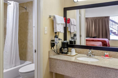 Combined shower/tub, hair dryer, towels, soap