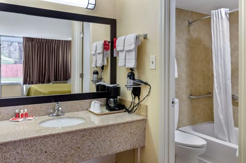 Combined shower/tub, hair dryer, towels, soap