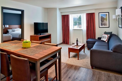 Suite, 2 Bedrooms | Living room | 32-inch Smart TV with cable channels, TV, Netflix