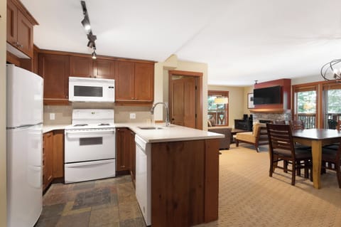 Two Bedroom #205 | Private kitchen | Fridge, microwave, oven, stovetop