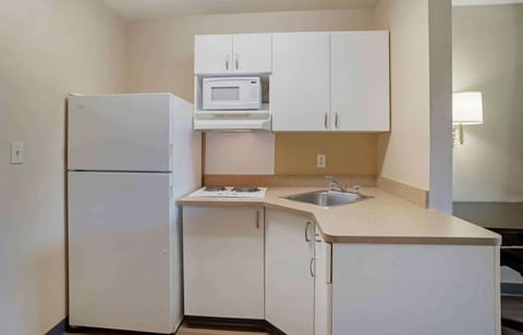 Studio, 1 Queen Bed, Non Smoking | Private kitchen | Full-size fridge, microwave, stovetop, coffee/tea maker