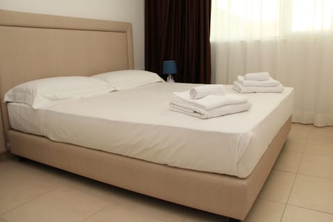 Premium bedding, memory foam beds, minibar, blackout drapes