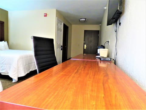 Queen Room with Two Queen Beds - Non-Smoking | Desk, blackout drapes, iron/ironing board, rollaway beds